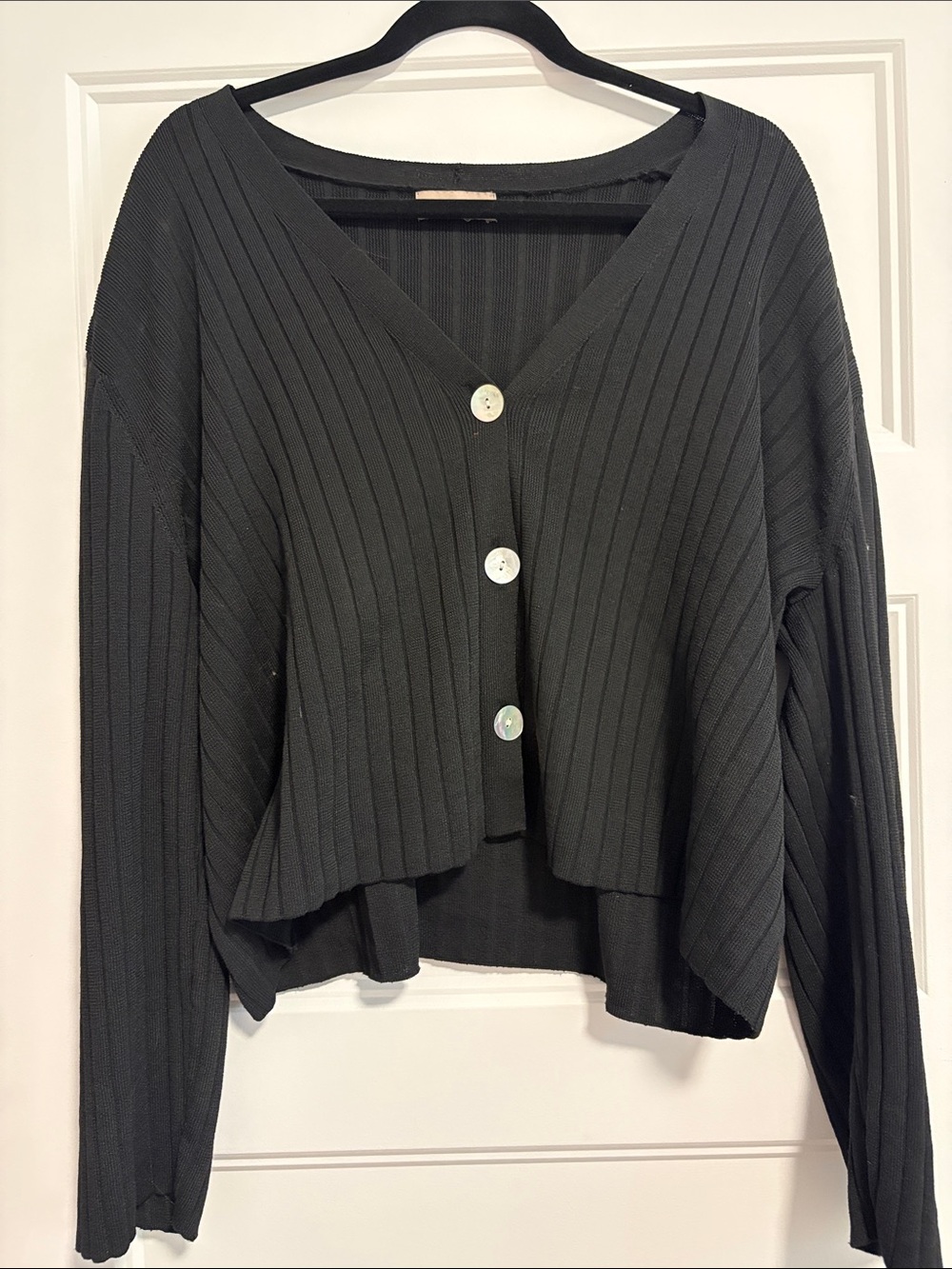 Women's boxy cut Black Ribbed V-Neck Button Cardigan with seashell buttons